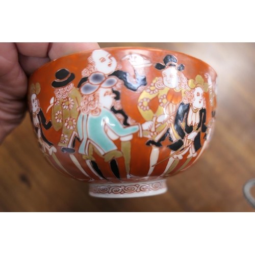 73 - Unusual Japanese bowl, 19th Century, decorated with Dutch traders in polychrome colours, opposing a ... 