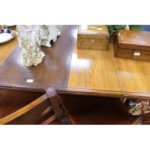 928 - Late Victorian walnut wind-out dining table, when closed 132cm x 107cm with one extra leaf, 50cm, wi... 