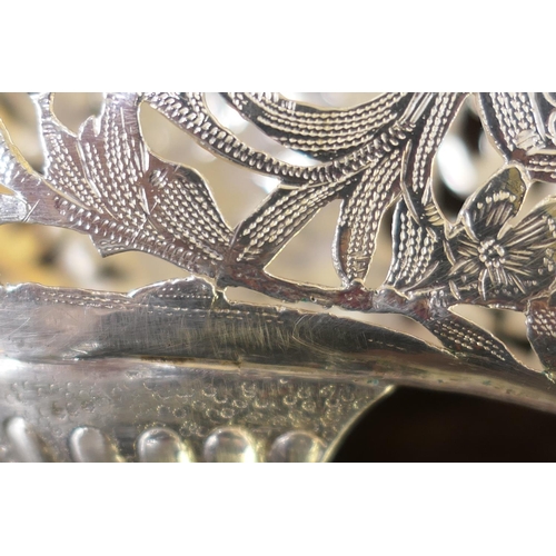 191 - Continental silver shoe form cornucopia vase, import marks for Chester 1900, pierced and chased thro... 