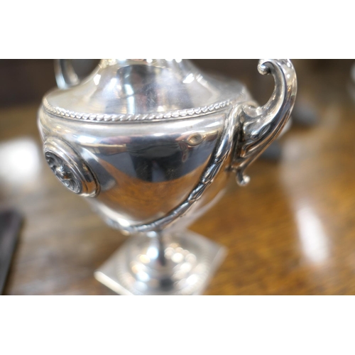 238 - George V silver urn tea caddy, maker CWF, Sheffield 1929, domed cover with pinecone finial, shoulder... 