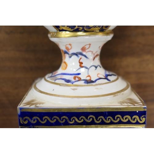 83 - Derby imari porcelain garniture, circa 1800-25, each of twin handled urn shape, decorated in typical... 