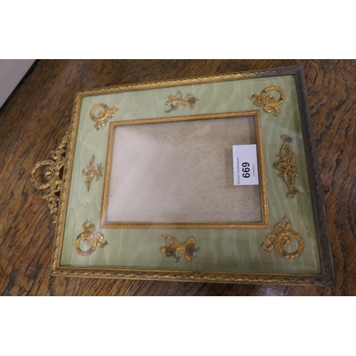 669 - French Empire Revival brass photograph frame, aperture size 14.5cm x 10.5cm, the frame 18cm x 20cm