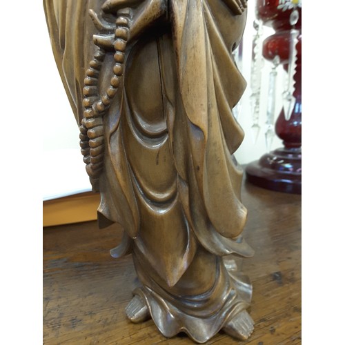 640 - Chinese carved wooden figure of Guanyin, late 19th Century, height 42cm