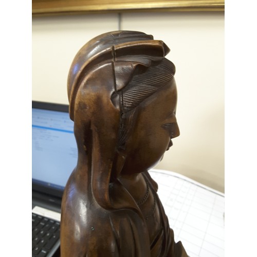 640 - Chinese carved wooden figure of Guanyin, late 19th Century, height 42cm