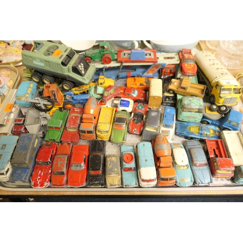 36 - Quantity of Corgi and other played-with die cast vehicles