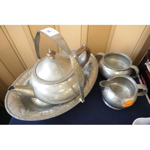 54 - Liberty pattern 01075 hammered pewter three piece tea service, together with a hammered pewter baske... 