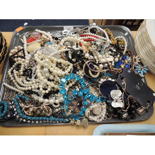 133 - Assortment of costume jewellery including necklaces, brooches, bracelets etc.