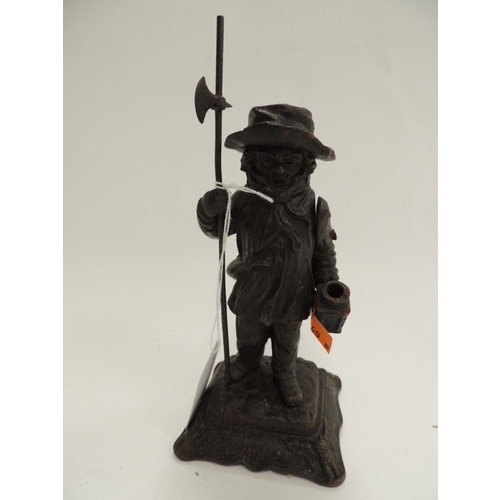 239 - Unusual cast iron figure cast as a lamplighter