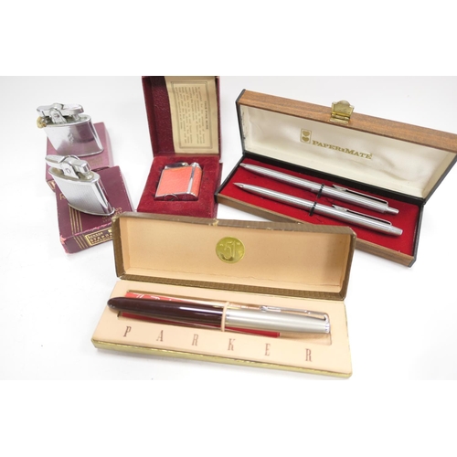 417 - Parker 51 fountain pen, boxed, with instructions, Papermate pen set, various cigarette lighters