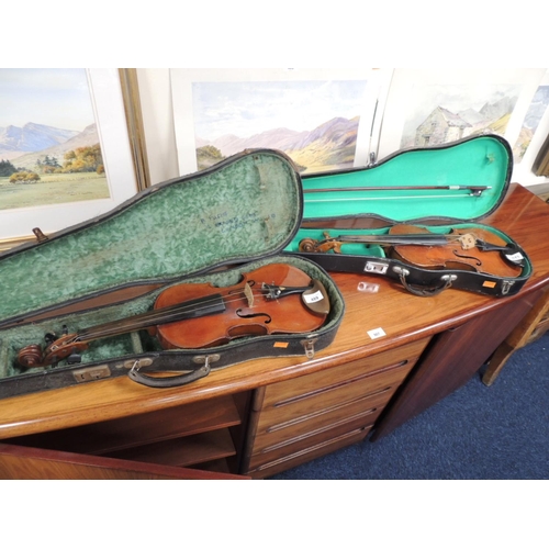 489 - Two early 20th Century cased violins, one being 13.75