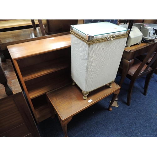 573 - Teak glazed bookcase, Lloyd Loom style linen basket and a glass topped coffee table (3)