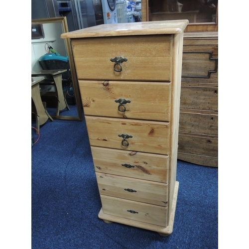 561 - Pine six drawer pillar chest