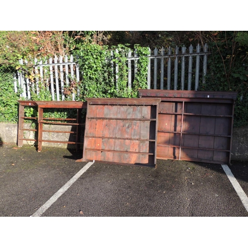 555 - Two boarded dresser plate racks, one being 183cm wide, the other 149cm; and two open plate racks (4)