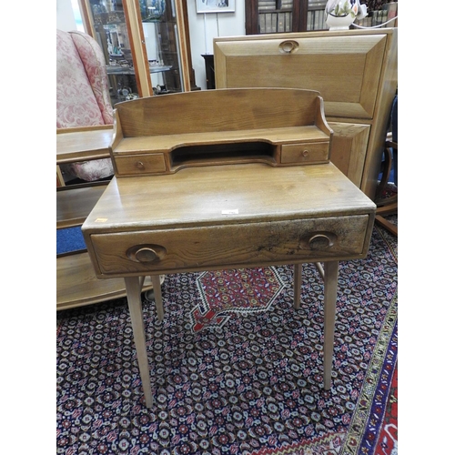 795 - Ercol light elm writing table, width 69cm