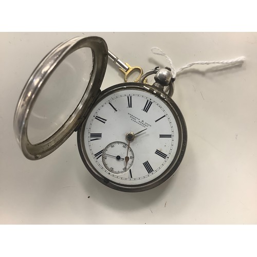 341 - Roberts & Owen, Carnarvon silver cased key wind pocket watch, hallmark Chester 1898, 51mm, with key ... 