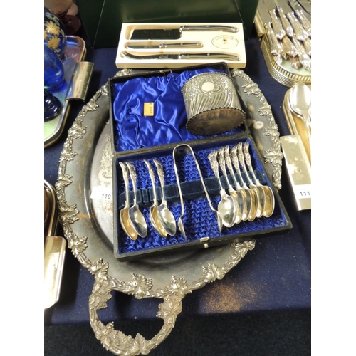 110 - Silver plated and twin handled serving tray; also silver plate on nickel oval tea caddy, part cased ... 