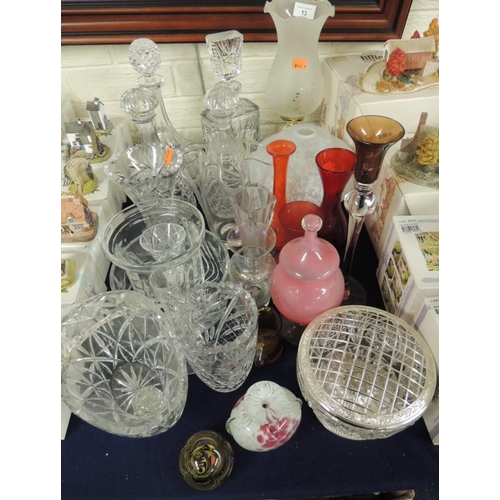 13 - Mixed glassware including four decanters, handkerchief vase, further vases, fruit bowls, coloured gl... 