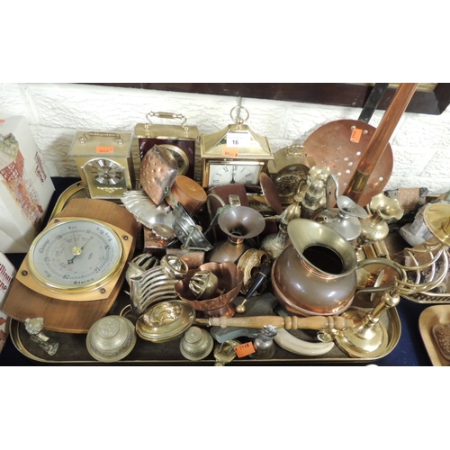 16 - Mixed brass and copper wares including hunting horn, candlestick, water jugs etc; also four mantel c... 