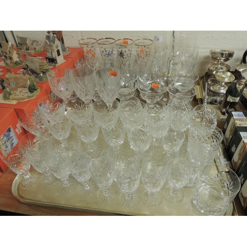 29 - Mixed modern glassware including wine glasses, port glasses, champagnes, whisky tumblers; also pedes... 