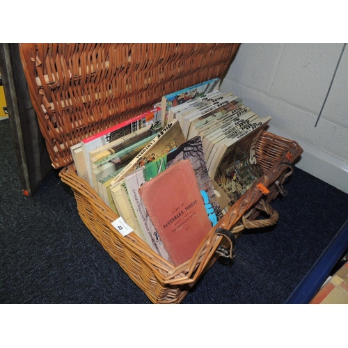 48 - Collection of Giles' cartoon annuals and an 1899 map of Savernake Forest in a picnic basket