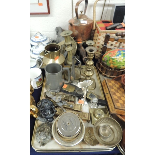 85 - Mixed metal wares including copper kettle, brass trivet, candlesticks, water jugs, door knockers and... 