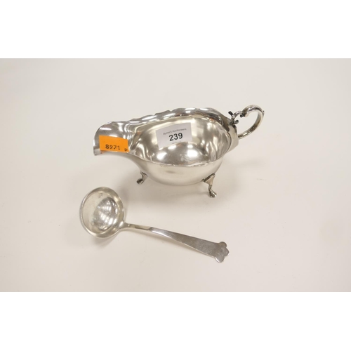 239 - Silver sauceboat with matching ladle, weight 126g