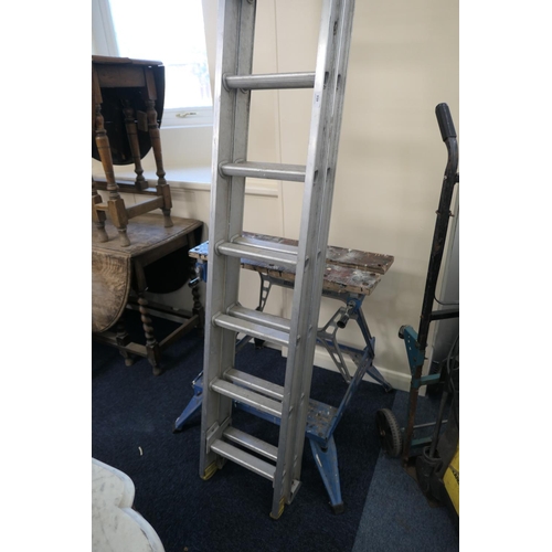 464 - Long aluminium extending ladders, extending to approximately 8m, and a Black & Decker Workmate