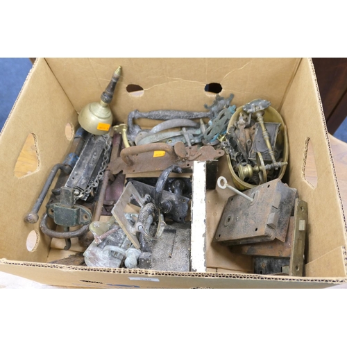 549 - Assorted metal door furniture including old locks, handles, bolts etc.