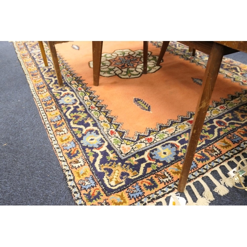 551 - Moroccan salmon pink ground woollen carpet, 260cm x 173cm