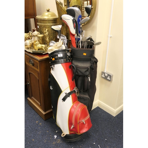 588 - Two lots of golf clubs in bags