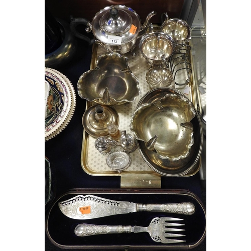 113 - Silver plated wares including a three piece tea service, pair of folded serving dishes, candle holde... 