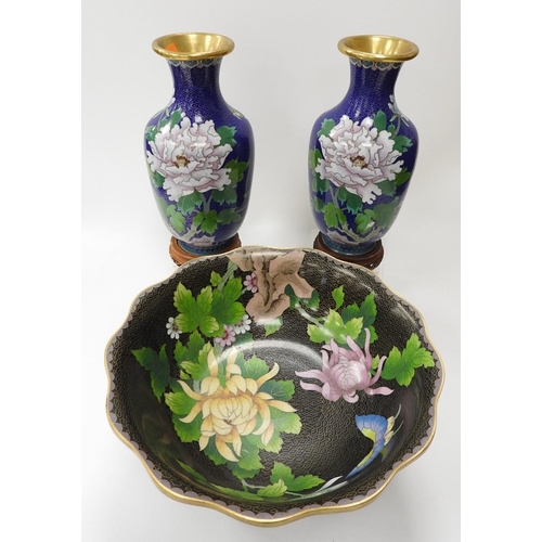 189 - Pair of blue floral decorated cloisonne vase, on carved wooden stands, height 23cm, also a black gro... 