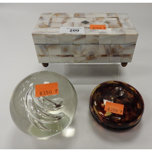 200 - Mother of pearl musical jewellery box, also a brown ground lidded trinket dish and a paperweight (3)