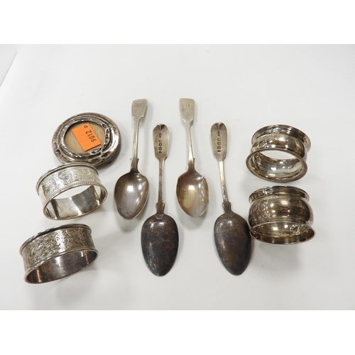 221 - Four silver teaspoons, also four silver napkin rings and a circular silver photograph frame (af), we... 