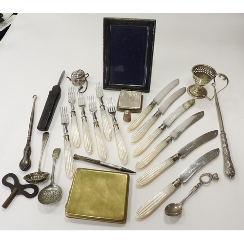 224 - Small amount of silver plated wares including mother of pearl handled flatware, photograph frame, eg... 