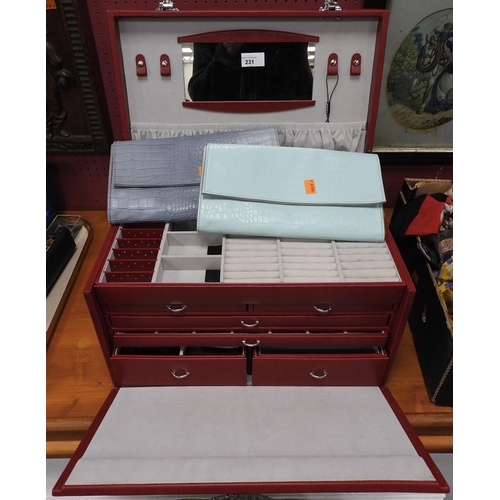 231 - Large red faux leather six drawer jewellery chest and two faux leather Gemporia jewellery wallets (3... 