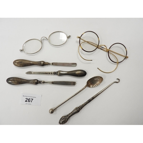 267 - Three silver handled manicure items, silver spoon, silver handled button hook, two spectacles (7)