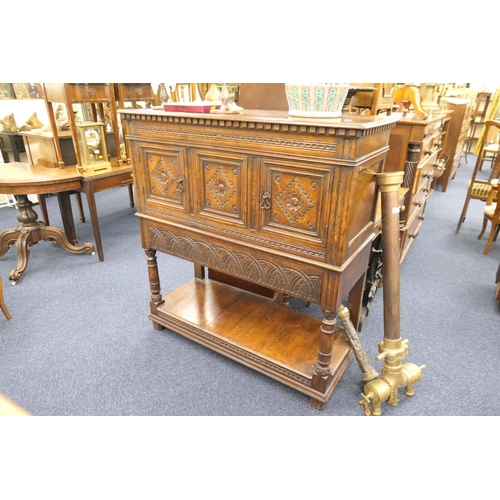 518 - Reproduction carved oak buffet cabinet with pot board base, width 112cm, height 121cm