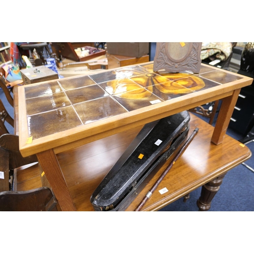 523 - Retro teak and tile topped coffee table, 97cm x 51.5cm