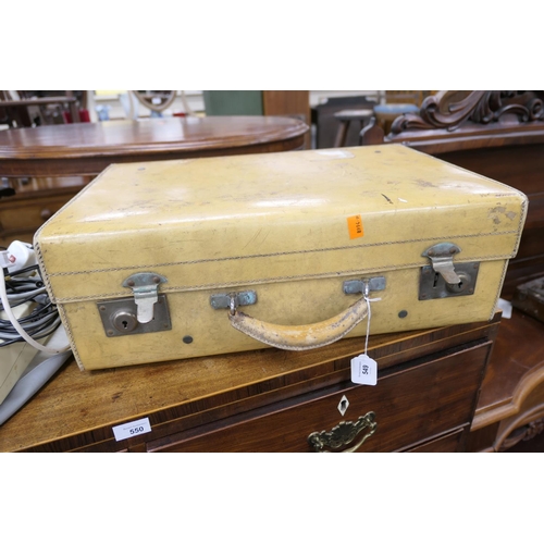 549 - Vellum suitcase