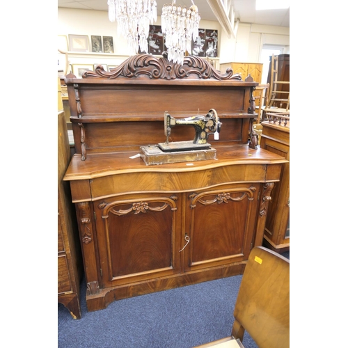 553 - Victorian mahogany serpentine front chiffonier, width 133cm, height 155cm