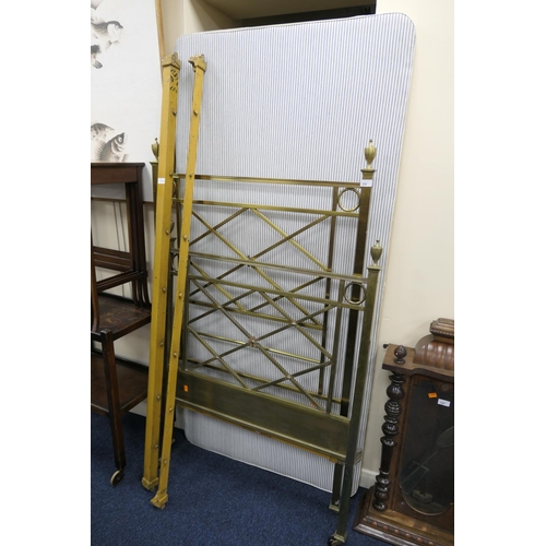 556 - Edwardian brass single bed with irons