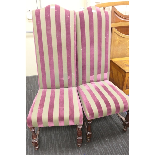 574 - Pair of upholstered high back chairs in purple and green striped fabric