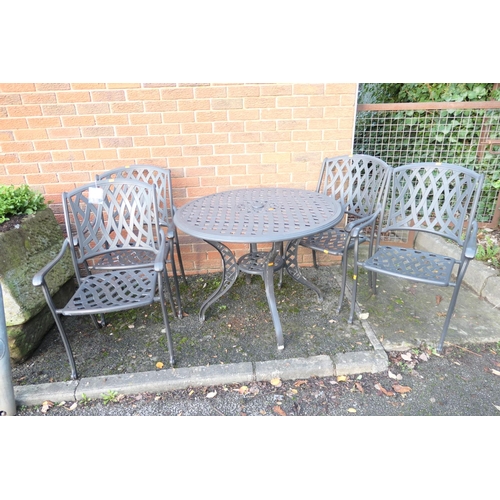 576 - Painted alloy garden suite comprising circular table and four armchairs (5)