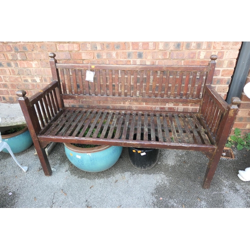 579 - Wooden slatted garden bench, width 138cm