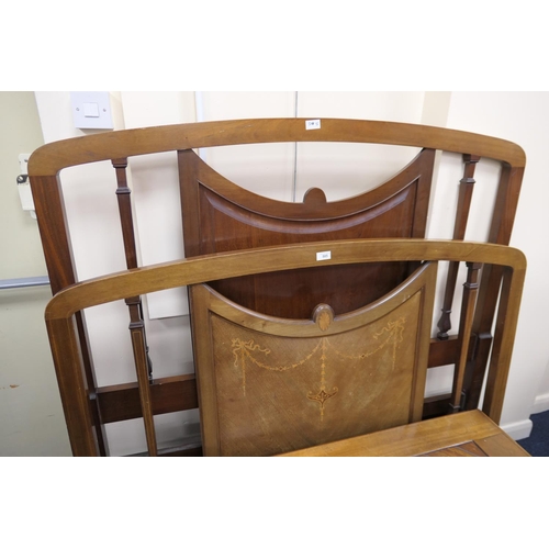 585 - Pair of Edwardian mahogany and inlaid double bed ends (no irons), width 138cm