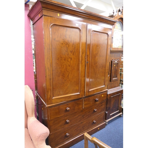 590 - Victorian mahogany linen press enclosing four trays, width 133cm, height 208cm