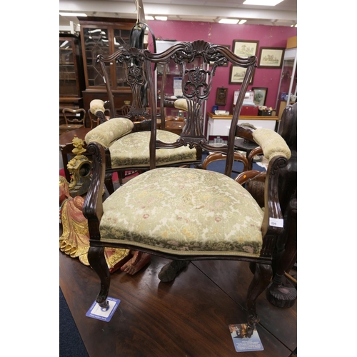 606 - Pair of late Victorian carved mahogany upholstered armchairs