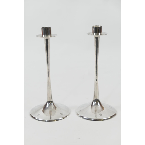 113 - Pair of modern silver candlesticks, slender form on a trumpet base, marked '925' (loaded), height 21... 