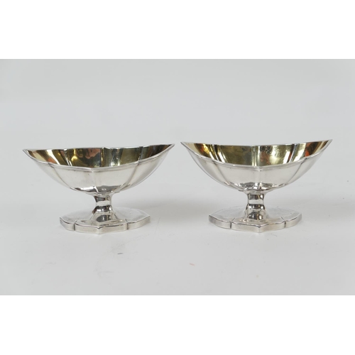 131 - Pair of George III silver table salts, by Abraham Peterson, London 1798, of boat shape, fluted and w... 